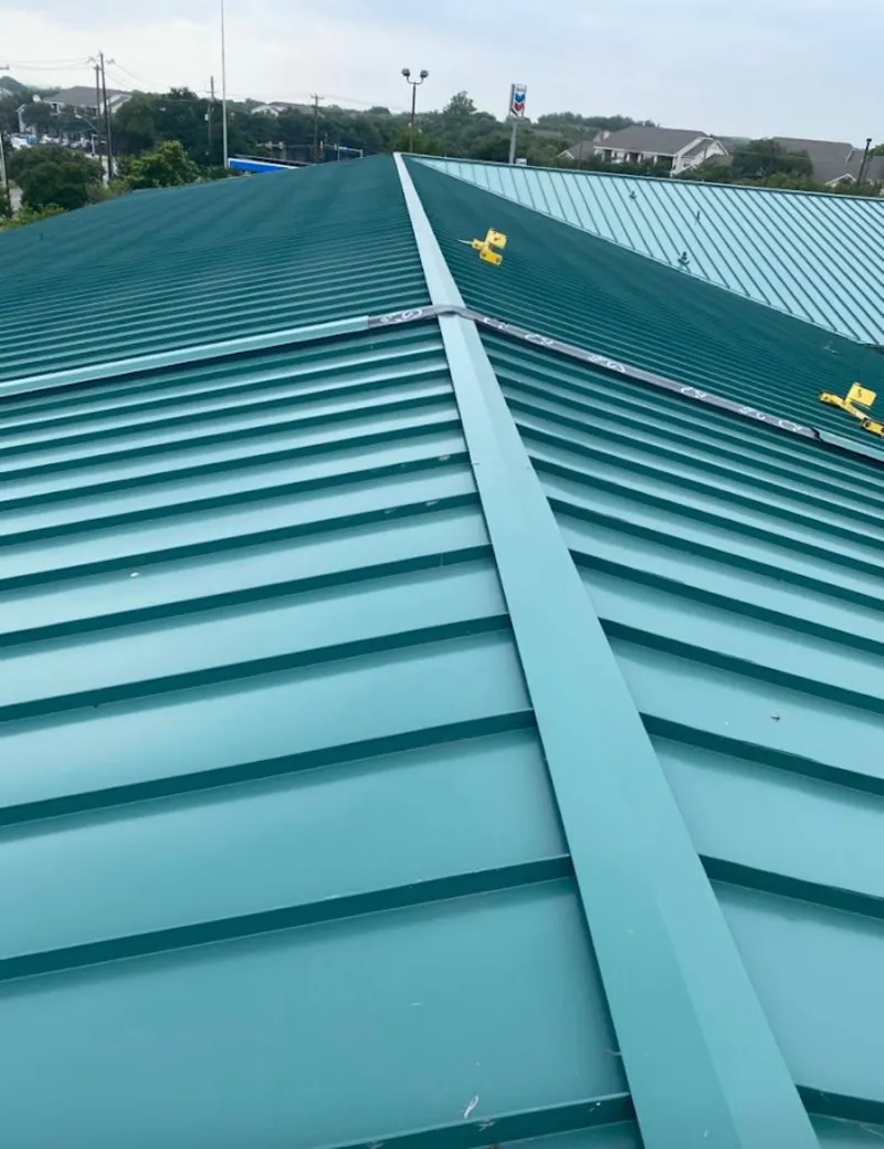 Green commercial metal roof ridge and valley for Metal Roof Repair in Orrville