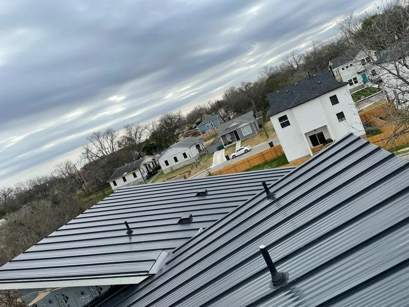 Standing seam metal roof panels with vents for Skylight Repair in Orrville